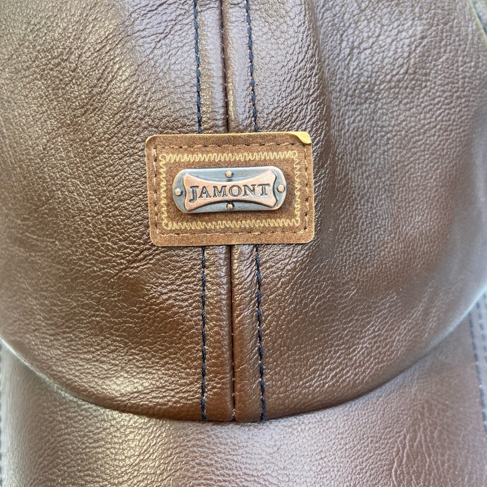 Brown Leather Hat with Ornate Metal Plate